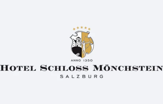 Logo von Hotel Schloss Mönchstein mit Salzburg-Text und Emblem